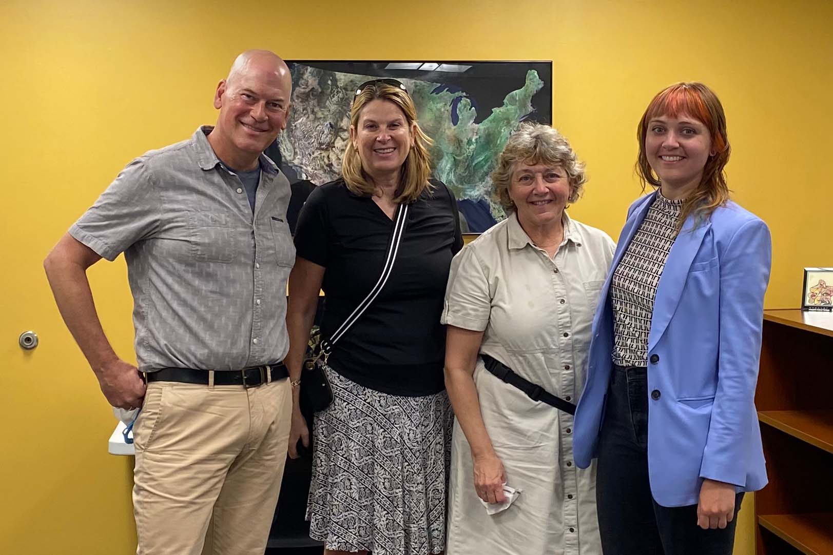From left, Professors David Rain and Lisa Benton-Short with Karen and Rys Young in the new Samson Hall computer lab.