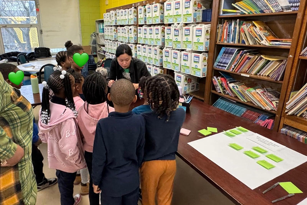 Emily Zhang leads green schoolyard design visioning activities with elementary school students in Chicago.