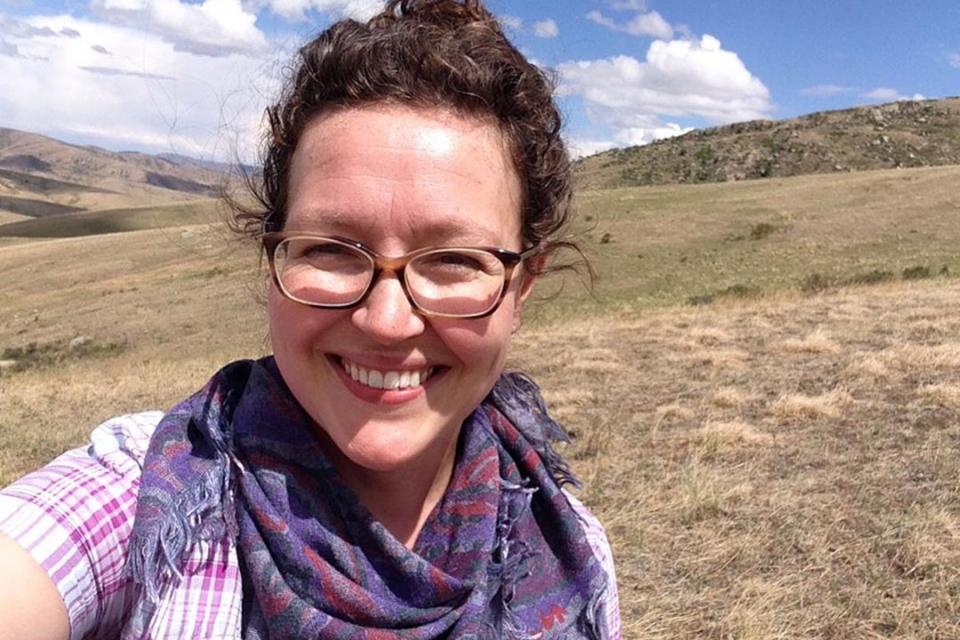 Ginger Allington smiling in front of Hustai National Park